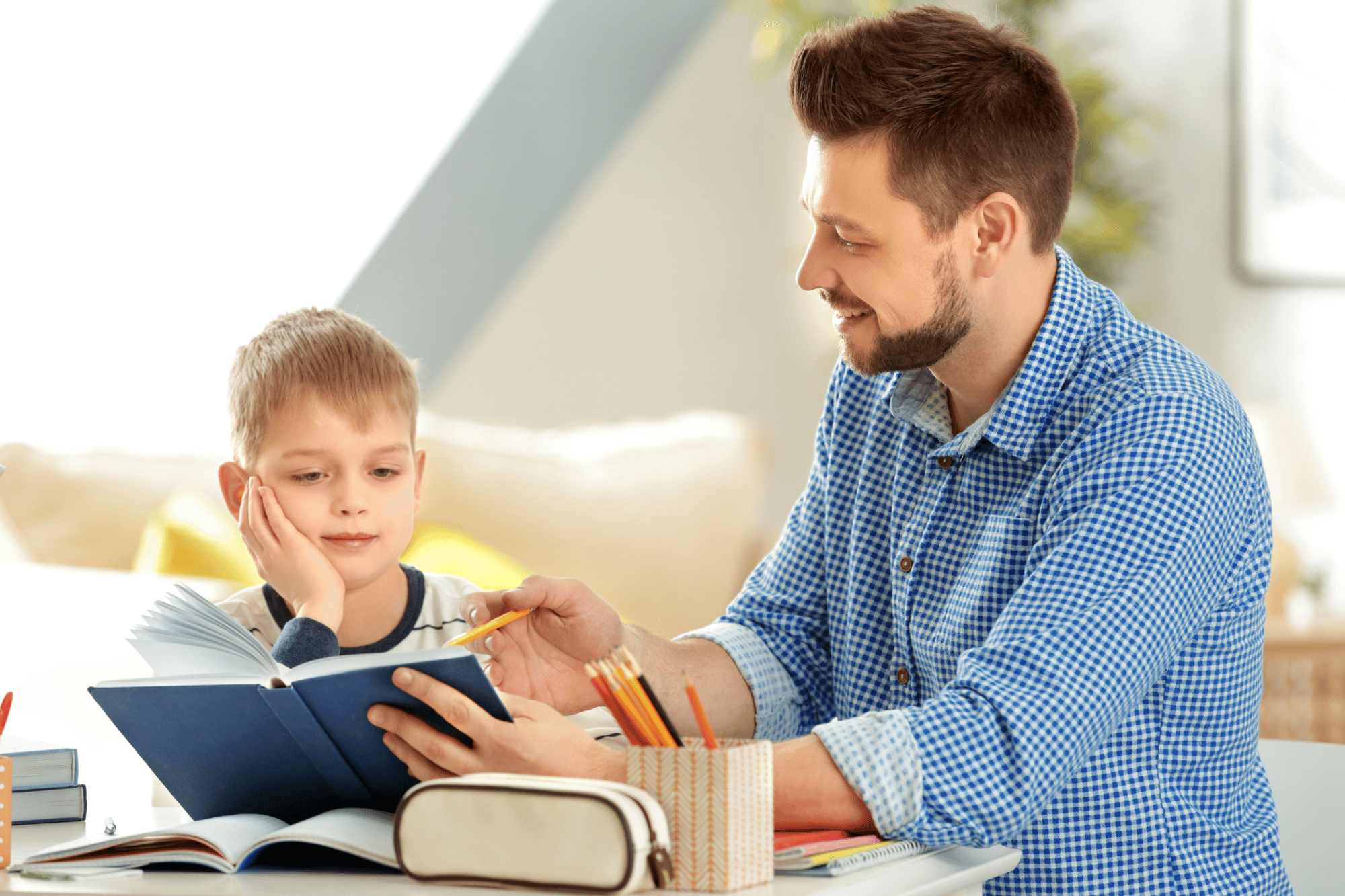 Father and son studying together at home: I need a tutor for my child?